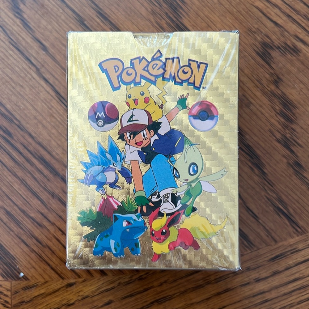 New in plastic Pokémon foil gold card 110 pack